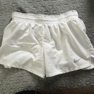 White Nike shorts